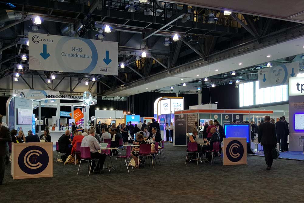 Delegates relax in the Confed17 exhibition hall